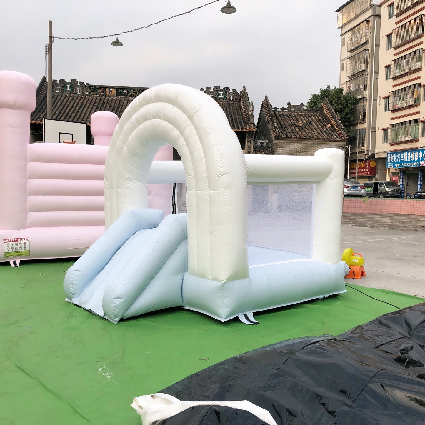 White And Blue Rainbow Bounce House