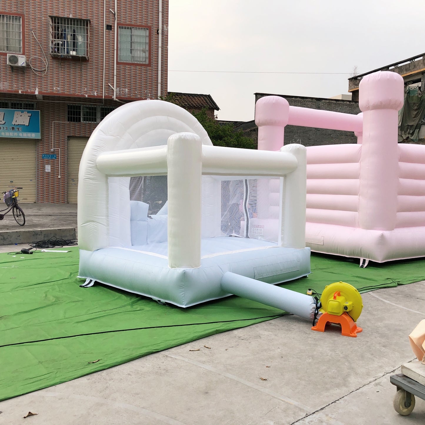 White And Blue Rainbow Bounce House
