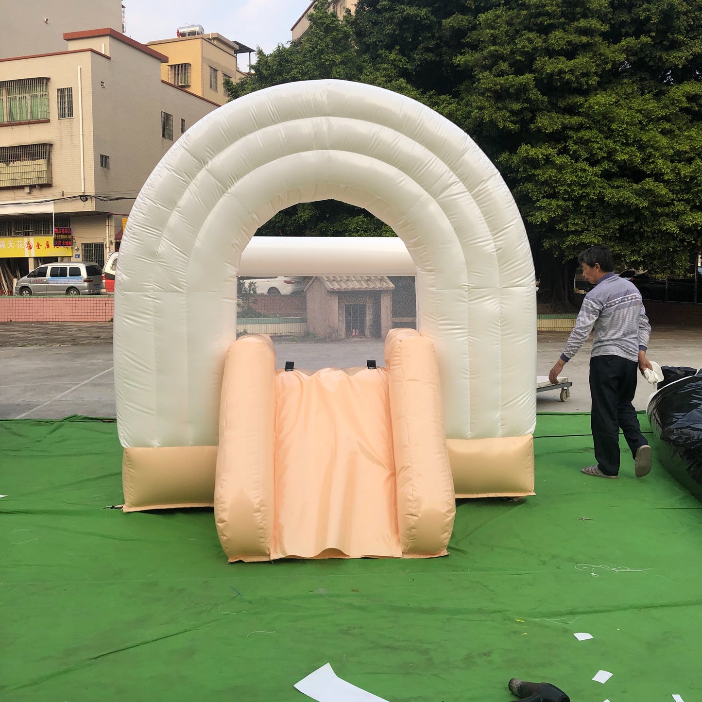 Peach And White Rainbow Bounce House